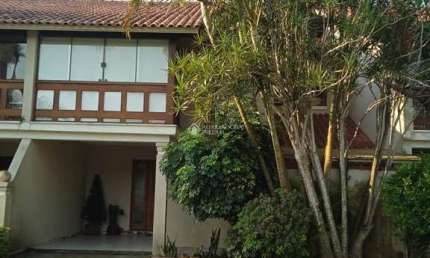 Casa em condomínio fechado com 4 quartos à venda na Avenida Eduardo Prado, 2050, Cavalhada, Porto Alegre, 300 m2 por R$ 1.300.000