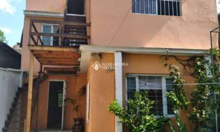 Casa com 4 quartos à venda na Rua Aldrovando Leão, 85, Vila Jardim, Porto Alegre, 264 m2 por R$ 890.000