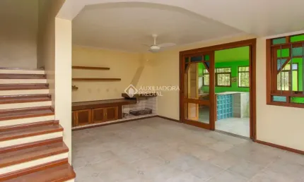Casa com 3 quartos à venda na Rua Augusto Lourenço Martins, 110, Vila Nova, Porto Alegre, 185 m2 por R$ 530.000
