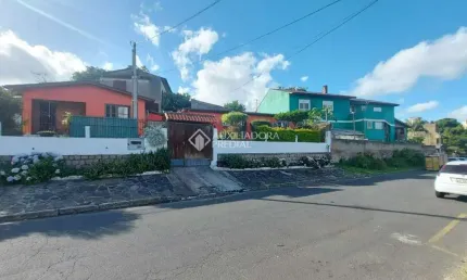 Casa com 6 quartos à venda na Rua Sargento Manoel Arruda, 221, Jardim Carvalho, Porto Alegre, 183 m2 por R$ 440.000