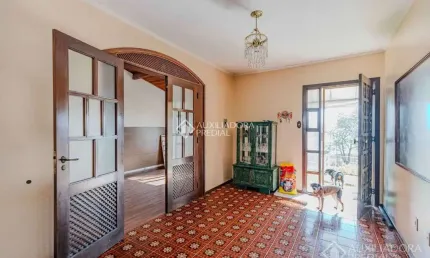 Casa com 4 quartos à venda na acesso das palmeiras, 100, santa tereza, porto alegre, 133 m2 por r$ 549.000