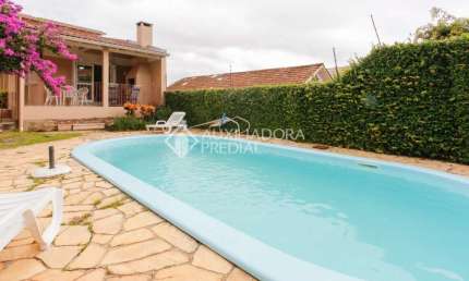 Casa com 3 quartos à venda na Rua César de Castro, 163, Teresópolis, Porto Alegre, 249 m2 por R$ 780.000
