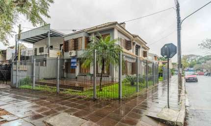 Casa em condomínio fechado com 4 quartos à venda na Rua Doutor Lossio, 400, Partenon, Porto Alegre, 201 m2 por R$ 1.490.000