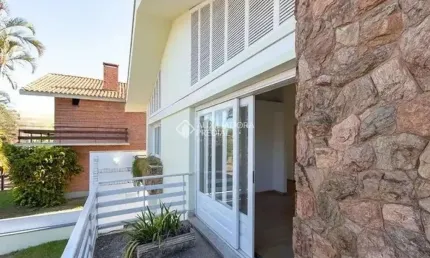 Casa com 3 quartos à venda na Rua Manauê, 76, Vila Assunção, Porto Alegre, 174 m2 por R$ 1.300.000