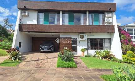 Casa em condomínio fechado com 3 quartos à venda na Rua Sinke, 236, Santa Tereza, Porto Alegre, 250 m2 por R$ 1.425.000