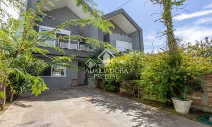 Casa com 3 quartos à venda na Rua Barão de Itaqui, 180, Jardim São Pedro, Porto Alegre, 126 m2 por R$ 1.150.000