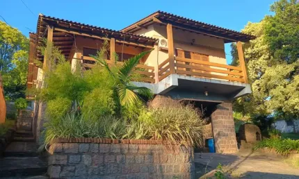 Casa com 3 quartos à venda na Avenida Vicente Monteggia, 2486, Cavalhada, Porto Alegre, 1534 m2 por R$ 1.750.000