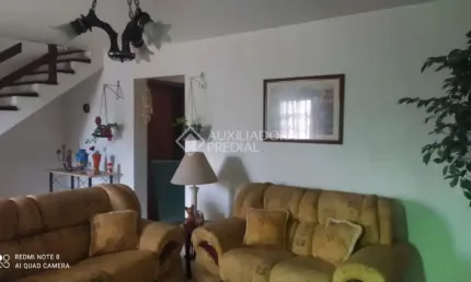 Casa em condomínio fechado com 3 quartos à venda na Rua Primeiro de Maio, 57, Partenon, Porto Alegre, 201 m2 por R$ 551.000