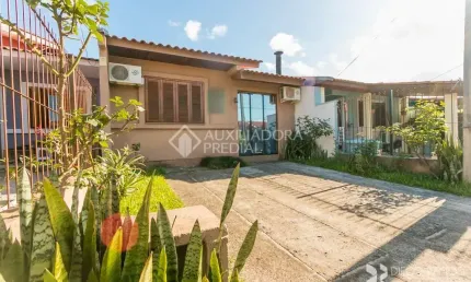Casa em condomínio fechado com 3 quartos à venda na Rua Adair Martinelli, 140, Hípica, Porto Alegre, 54 m2 por R$ 310.000