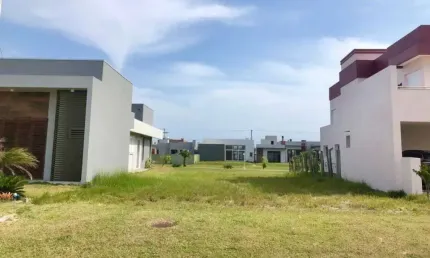 Terreno em condomínio fechado à venda na Avenida Diamante, 1173, Condomínio Riviera Xangri-Lá, Xangri-Lá, 371 m2 por R$ 540.000