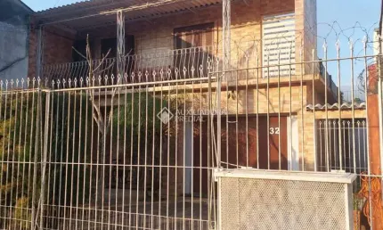 Casa com 5 quartos à venda na rua adroaldo novo correa, 32, cavalhada, porto alegre, 212 m2 por r$ 550.000