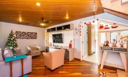Casa em condomínio fechado com 3 quartos à venda na Rua Erechim, 100, Nonoai, Porto Alegre, 190 m2 por R$ 730.000
