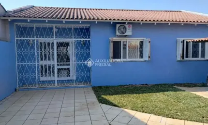 Casa em condomínio fechado com 3 quartos à venda na Rua Carlos Gomes, 215, Harmonia, Canoas, 110 m2 por R$ 600.000