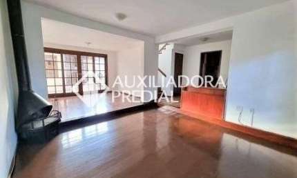 Casa em condomínio fechado com 3 quartos à venda na Rua Conrado Ferrari, 71, Jardim Isabel, Porto Alegre, 211 m2 por R$ 800.000