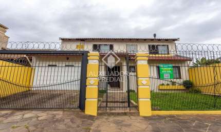 Casa com 4 quartos à venda na Rua das Petúnias, 277, Estância Velha, Canoas, 182 m2 por R$ 989.000