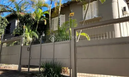 Casa em condomínio fechado com 4 quartos à venda na Rua Eudoro Berlink, 222, Auxiliadora, Porto Alegre, 240 m2 por R$ 2.350.000