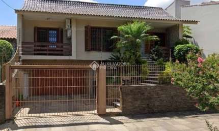 Casa com 4 quartos à venda na Rua Maestro Salvador Campanella, 70, Jardim Itu Sabará, Porto Alegre, 313 m2 por R$ 1.300.000