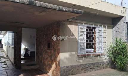 Casa com 3 quartos à venda na Rua Serro Azul, 103, Santa Maria Goretti, Porto Alegre, 136 m2 por R$ 770.000
