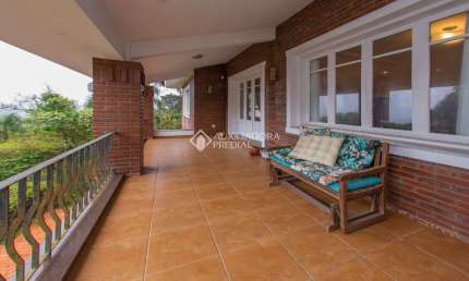 Casa com 4 quartos à venda na Rua Deputado Astério de Mello, 415, Teresópolis, Porto Alegre, 359 m2 por R$ 1.720.000