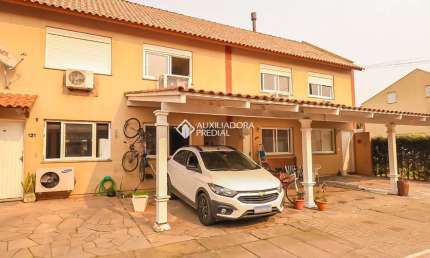 Casa em condomínio fechado com 2 quartos à venda na Rua Treze de Maio, 630, Rio Branco, Canoas, 103 m2 por R$ 280.000