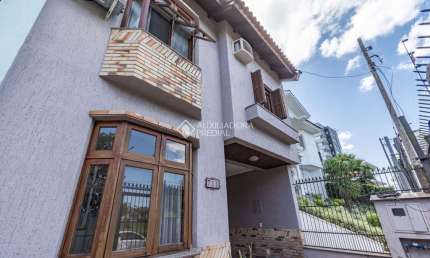 Casa com 3 quartos à venda na Rua Walir Zottis, 707, Jardim Itu Sabará, Porto Alegre, 157 m2 por R$ 720.000