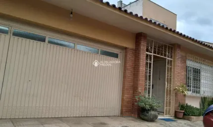 Casa com 3 quartos à venda na Rua Doutor Derly Monteiro, 490, Jardim Itu Sabará, Porto Alegre, 172 m2 por R$ 800.000