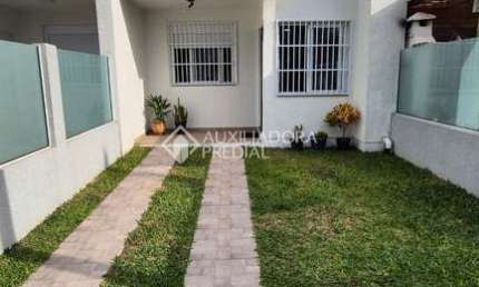 Casa com 2 quartos à venda na Sol Nascente, 223, Arco Íris, Capão da Canoa, 69 m2 por R$ 419.000