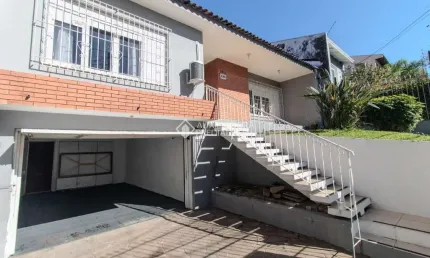 Casa com 3 quartos à venda na Rua Coronel Tisiano F. de Leoni, 290, Coronel Aparício Borges, Porto Alegre, 183 m2 por R$ 680.000