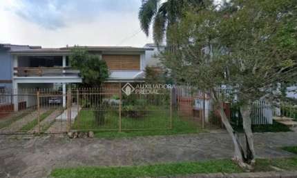 Casa em condomínio fechado com 3 quartos à venda na Avenida La Paz, 39, Jardim Lindóia, Porto Alegre, 301 m2 por R$ 2.350.000