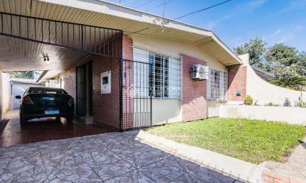 Casa com 3 quartos à venda na Avenida Brino, 409, Santa Maria Goretti, Porto Alegre, 140 m2 por R$ 640.000