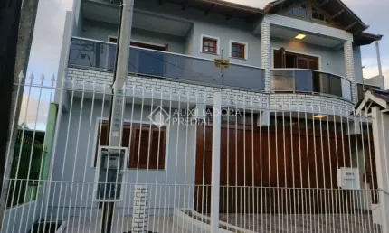 Casa com 3 quartos à venda na Rua Oscar Ferreira, 250, Rubem Berta, Porto Alegre, 310 m2 por R$ 680.000