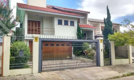 Casa em condomínio fechado com 4 quartos à venda na Rua Doutor Galdino Nunes Vieira, 354, Jardim Itu Sabará, Porto Alegre, 310 m2 por R$ 1.200.000