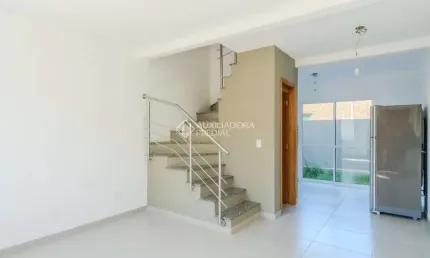 Casa em condomínio fechado com 2 quartos à venda na Rua Miguel Ascoleze, 125, Vila Nova, Porto Alegre, 60 m2 por R$ 319.000