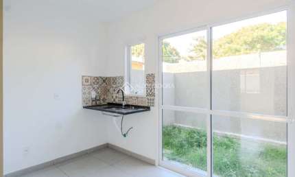 Casa em condomínio fechado com 2 quartos à venda na Rua Miguel Ascoleze, 125, Vila Nova, Porto Alegre, 60 m2 por R$ 319.000