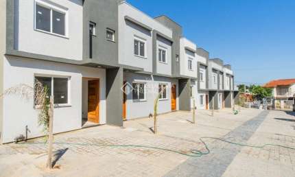 Casa em condomínio fechado com 2 quartos à venda na Rua Miguel Ascoleze, 125, Vila Nova, Porto Alegre, 60 m2 por R$ 319.000