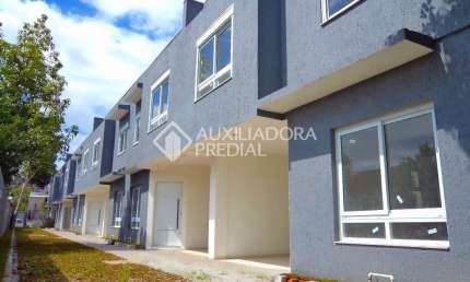Casa em condomínio fechado com 3 quartos à venda na Rua Doutor Mário Totta, 2430, Tristeza, Porto Alegre, 114 m2 por R$ 580.000
