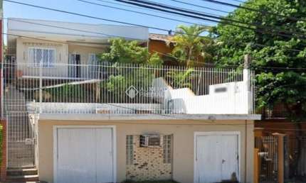Casa com 3 quartos à venda na Rua Doutor Barbosa Gonçalves, 41, Chácara das Pedras, Porto Alegre, 141 m2 por R$ 900.000