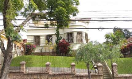 Casa em condomínio fechado com 3 quartos à venda na Rua Guilherme Schell, 209, Santo Antônio, Porto Alegre, 377 m2 por R$ 1.720.000