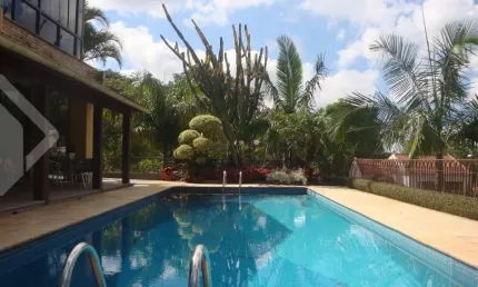Casa em condomínio fechado com 3 quartos à venda na Rua dos Guenoas, 501, Guarujá, Porto Alegre, 667 m2 por R$ 1.800.000