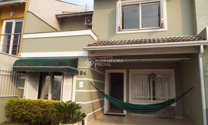 Casa em condomínio fechado com 3 quartos à venda na Rua Eroni Soares Machado, 194, Hípica, Porto Alegre, 124 m2 por R$ 650.000