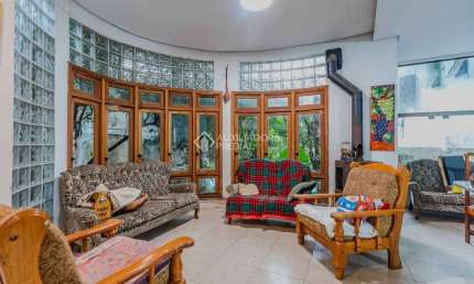 Casa em condomínio fechado com 6 quartos à venda na Rua Carlos Ferreira, 130, Teresópolis, Porto Alegre, 496 m2 por R$ 850.000