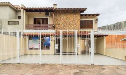 Casa com 4 quartos à venda na Rua Adão Pinheiro da Silva, 420, Ipanema, Porto Alegre, 356 m2 por R$ 1.190.000