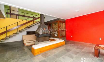 Casa em condomínio fechado com 3 quartos à venda na Rua Alcebíades Antônio dos Santos, 95, Nonoai, Porto Alegre, 360 m2 por R$ 1.480.000