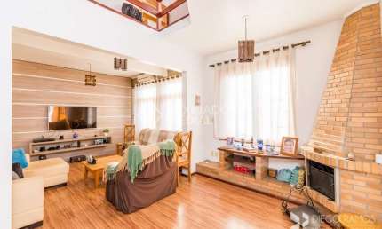 Casa em condomínio fechado com 3 quartos à venda na Rua Nunes, 200, Medianeira, Porto Alegre, 135 m2 por R$ 700.000
