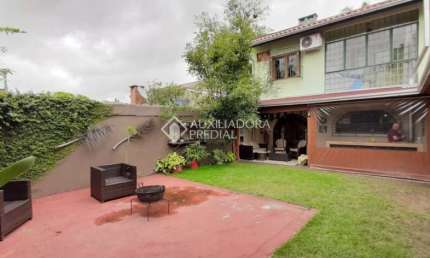 Casa com 3 quartos à venda na Rua Atlântida, 85, Ipanema, Porto Alegre, 330 m2 por R$ 1.115.000