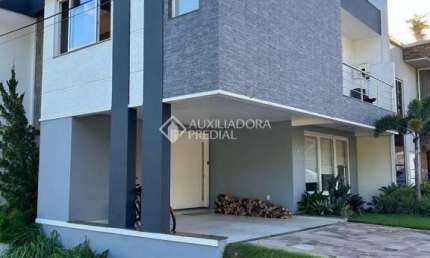 Casa em condomínio fechado com 3 quartos à venda na Rua Ivo Walter Kern, 599, Hípica, Porto Alegre, 260 m2 por R$ 1.200.000