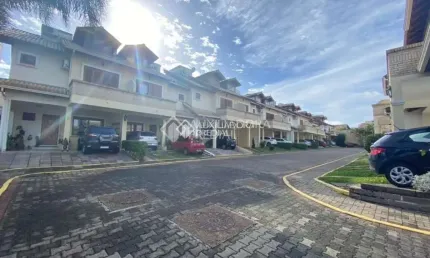 Casa em condomínio fechado com 3 quartos à venda na Avenida Eduardo Prado, 1954, Cavalhada, Porto Alegre, 192 m2 por R$ 948.860