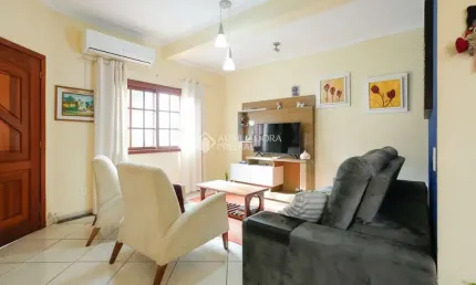 Casa com 3 quartos à venda na Avenida José Corrêa da Silva, 337, Cavalhada, Porto Alegre, 126 m2 por R$ 650.000
