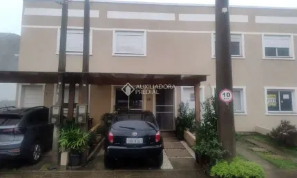 Casa em condomínio fechado com 2 quartos à venda na Rua Capitão Pedroso, 416, Restinga, Porto Alegre, 82 m2 por R$ 250.000