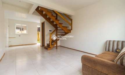 Casa em condomínio fechado com 2 quartos à venda na Rua Capitão Pedroso, 416, Restinga, Porto Alegre, 82 m2 por R$ 185.000
